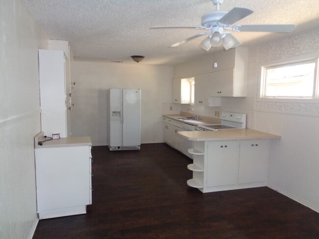 Building Photo - FOUR BEDROOM