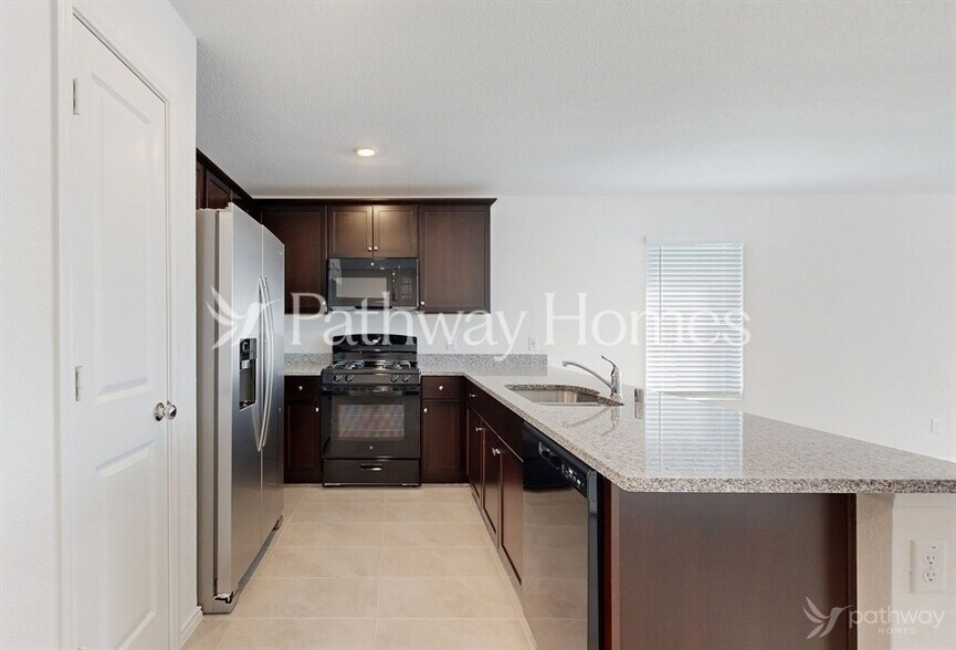 Building Photo - 6501 Cannonade Dr