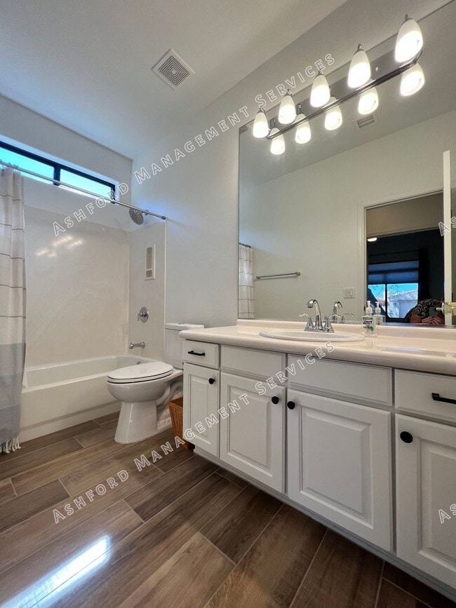 Building Photo - COME HOME TO LUXURY IN GATED GRAYHAWK GOLF...