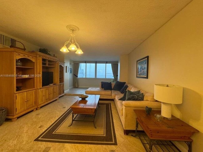 Building Photo - 5005 Collins Ave