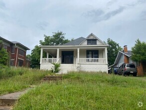 Building Photo - Three bedroom two bath house ready for a n...