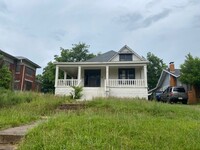 Building Photo - Three bedroom two bath house ready for a n...