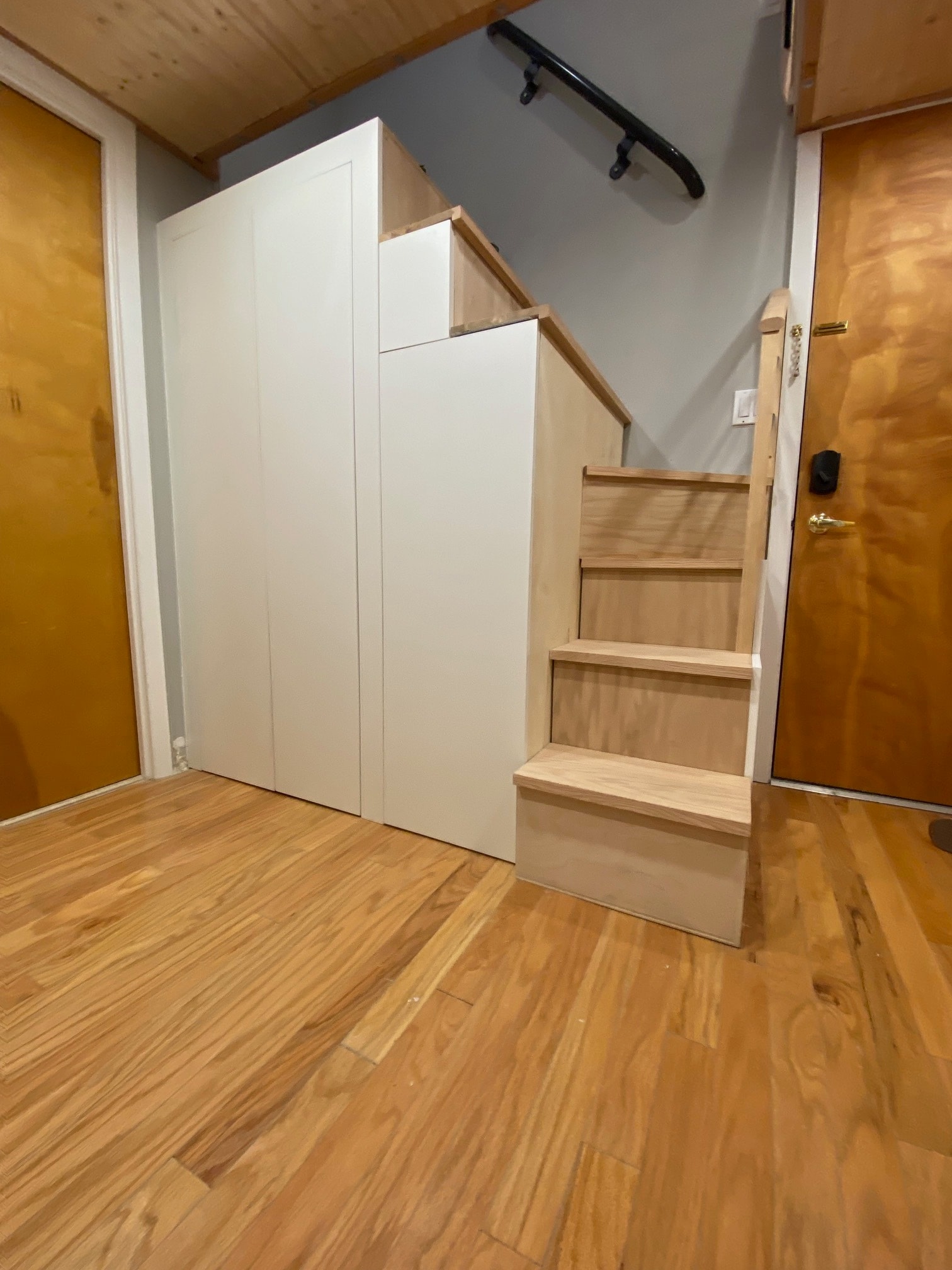 Extra storage in custom steps to loft - 61 Grand St