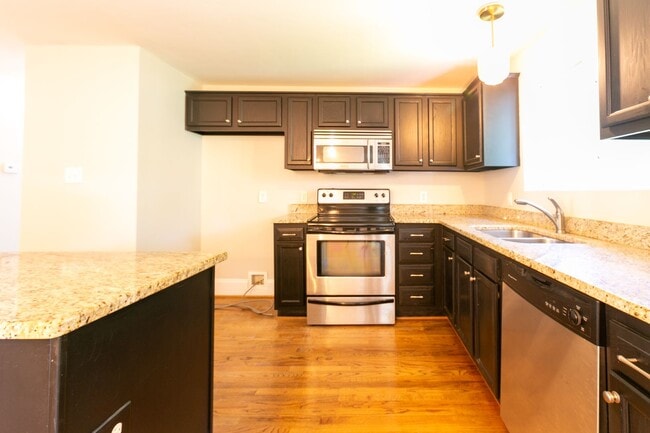 Building Photo - **Application pending 5/1/2026**Stunning Carrboro Condo available early June!