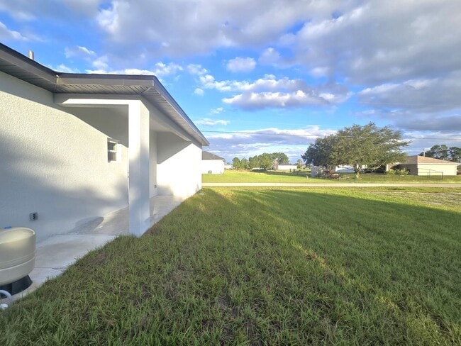 Building Photo - Brand-New 2/2/1 -SW Lehigh Acres-See this ...