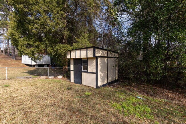 Building Photo - Newly Renovated 4BR/2BA Home with Large Yard + Storage Shed | Flexible Kitchen Island