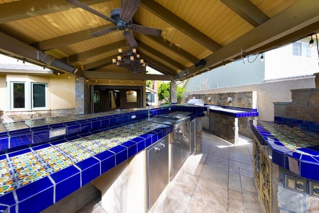 Building Photo - Beautifully maintained Tuscan-style custom home