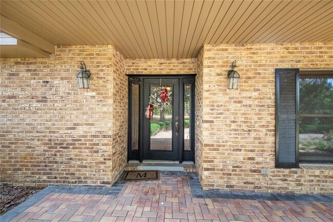 Building Photo - 7740 Lake Hatchineha Rd