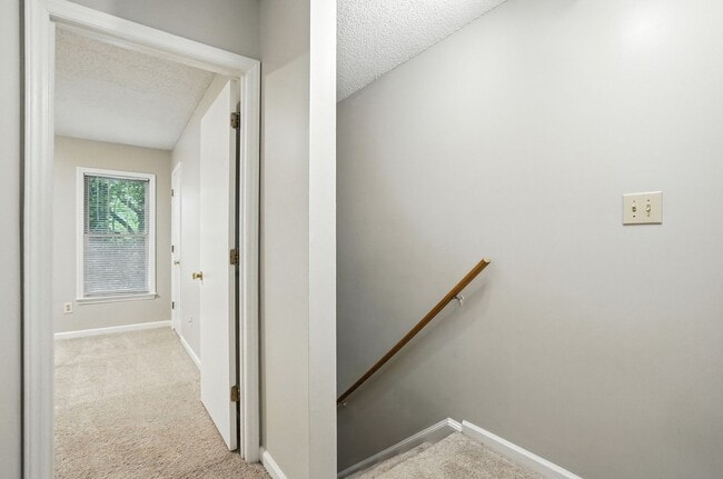 Building Photo - Spacious 2-Bedroom, 2.5-Bath End-Unit Town...