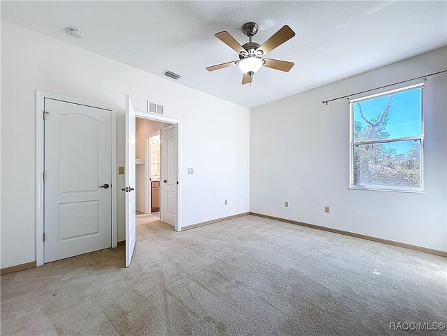 Building Photo - 5950 N Petunia Terrace