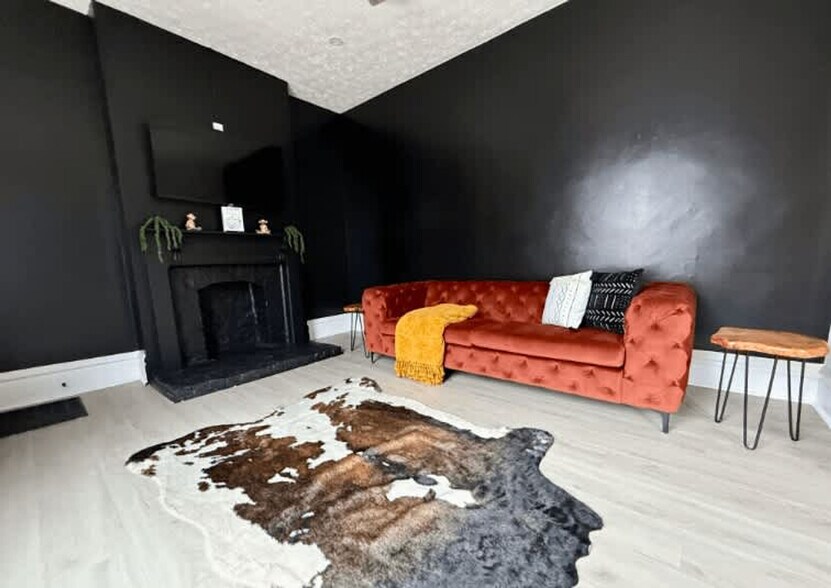 Building Photo - 309-311-311 W 4th Ave