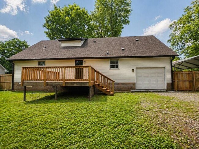 Building Photo - Welcome home to the perfect blend of peaceful country charm and modern city living!