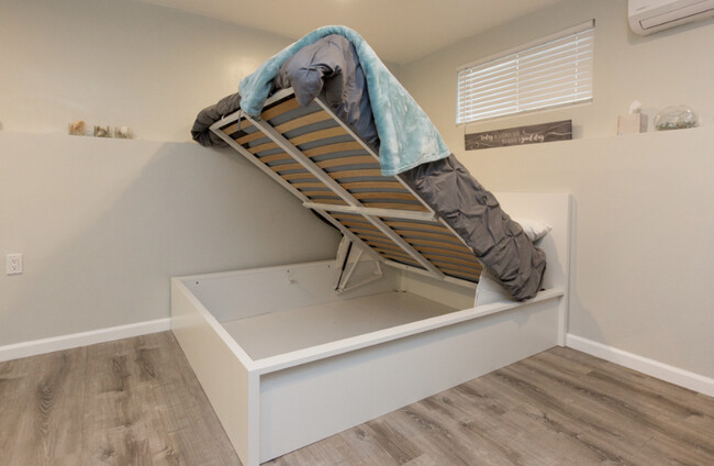 Bed lifts for storage - 6578 Malcolm Drive