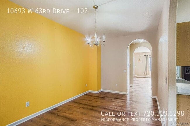 Building Photo - 10693 W 63rd Dr