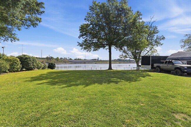 Building Photo - Stunning 4-Bedroom Waterfront Retreat with Modern Upgrades & Lake Living.