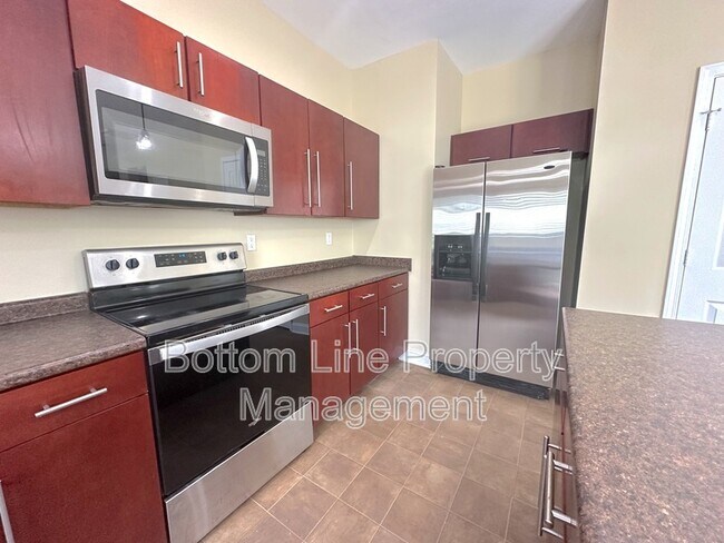 Building Photo - 6223 Woodland Commons Dr