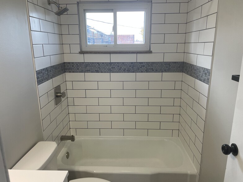Tiled shower and floor - 36 S Norwich Rd