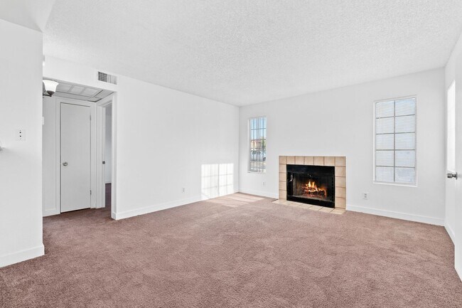 Building Photo - Spacious 2-Bedroom Condo with Fireplace – ...