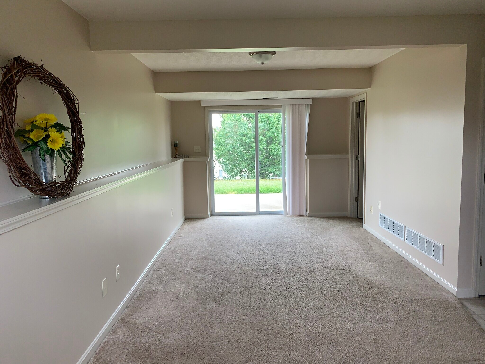 Lower level family room gives extra play space and has a walk out to the back yard - 6869 Gordon Blvd