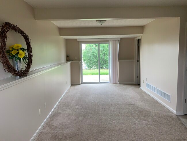 Lower level family room gives extra play space and has a walk out to the back yard - 6869 Gordon Blvd