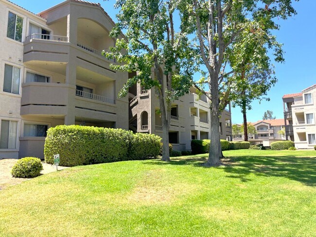 Building Photo - 1BR Condo with Private Balcony, Central A/C & Community Amenities in Corona