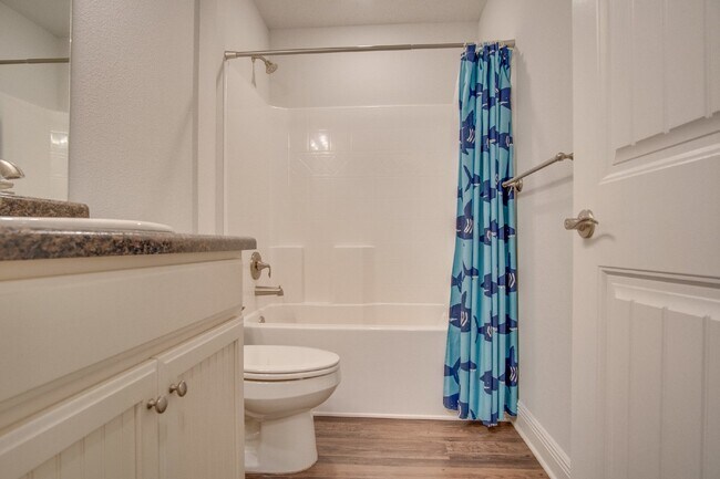 Building Photo - Spacious 4BR/2BA Brick Home with 2-Car Garage, Granite Kitchen, Vaulted Ceilings & Fully Fenced B...