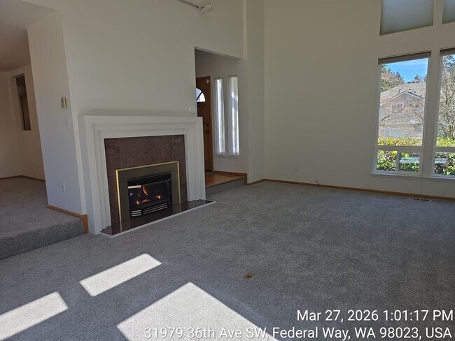 Building Photo - Twin Lakes life on a golf course -4 level home -  4 bedroom 2.5 bathroom with 2 car garage - Move...