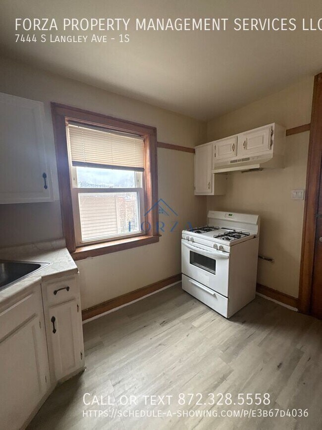 Building Photo - 7444 S Langley Ave