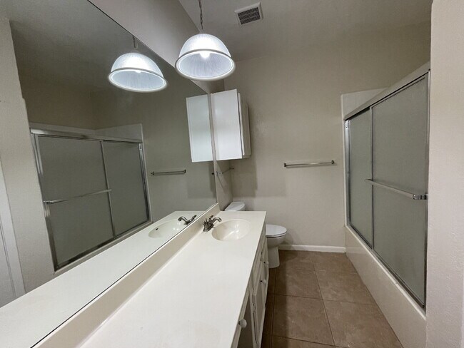 Building Photo - Live in the city of Panorama Village & enjoy all it has to offer: 27-hole golf course, 3 city par...