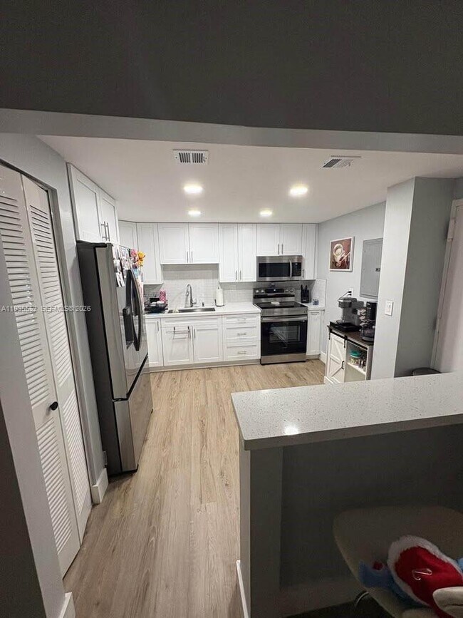 Building Photo - 6841 SW 147th Ave