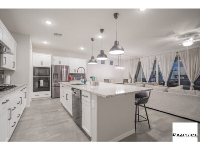 Building Photo - Presenting An Exquisitely Crafted 3/2.5 Goodyear Jewel Where Modern Sophistication Meets Serene Comf