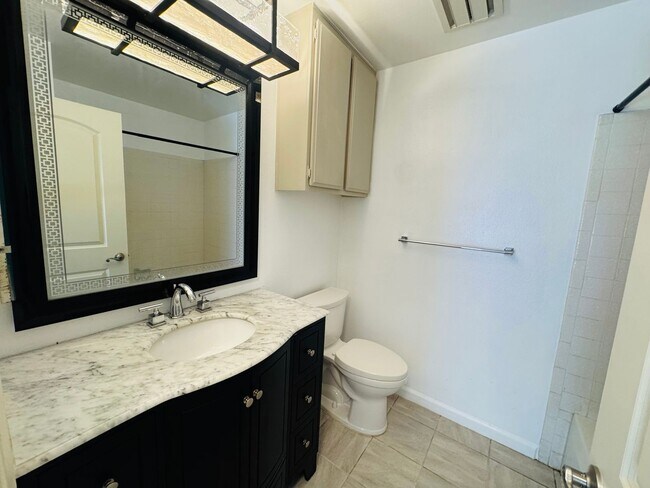 Building Photo - Don’t Judge the Outside—This 3BR Stuns Inside