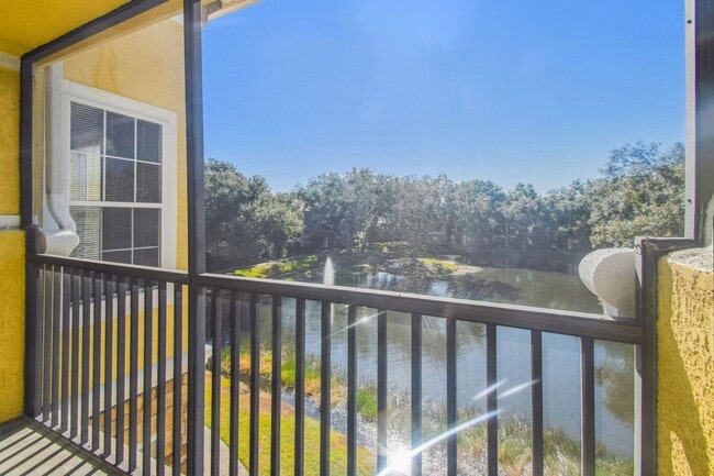 Building Photo - Elegant 1-Bedroom Condo with Lakeside Views in Resort-Style Community