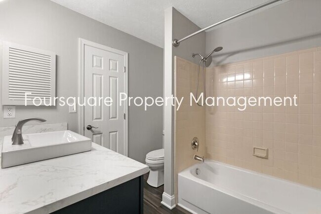 Building Photo - Charming 1st-Floor End-Unit Condo with Gas Log Fireplace, Private Back Porch & Community Pool – T...