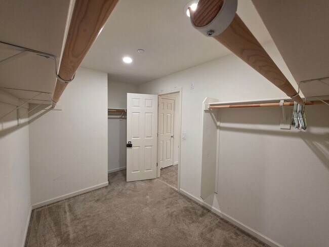 Building Photo - Spacious 5BR + Loft in Hamptons Village – Studio Suite, New HVAC, EV Charging