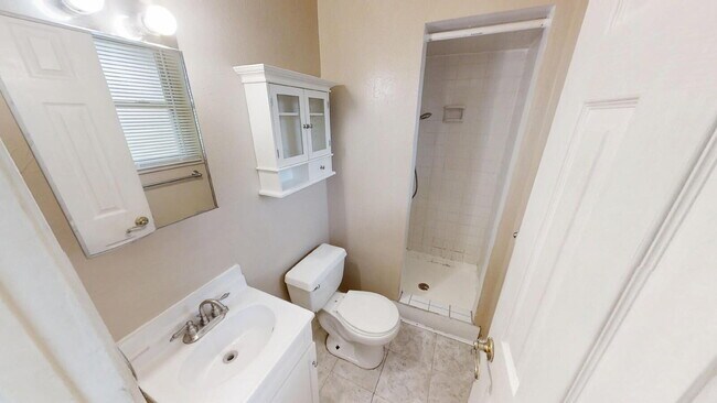 Building Photo - Welcome home to this adorable 3-bedroom, 2-bathroom house designed with comfort and style in mind!