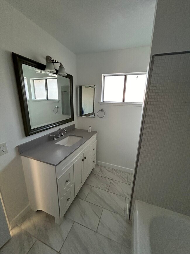 Upstairs shared restroom - 11690 Kismet Ave