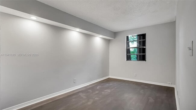 Building Photo - 9487 NW 42nd St