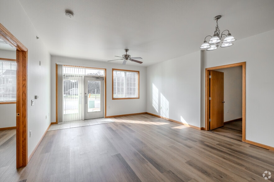 1BR+Den, 1BA - 851SF - Living Room - The Commons of Foxboro