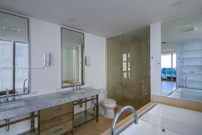 Building Photo - 9701 Collins Ave