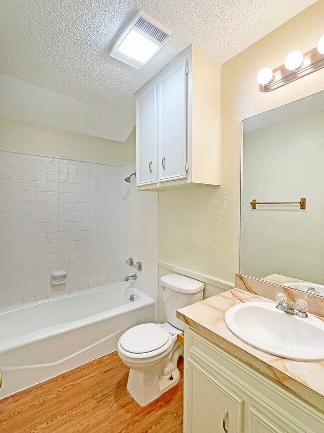 Building Photo - Spacious 3-Bedroom Duplex with Covered Parking & Fenced Yard!