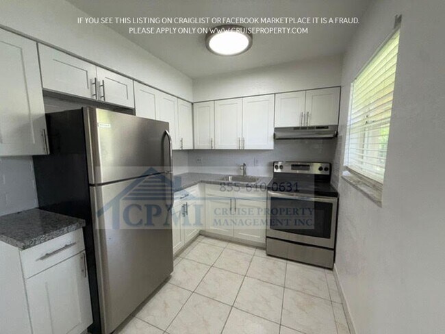 Building Photo - 497 NW 40th Ct