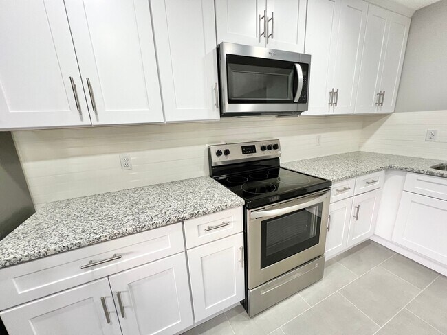 Building Photo - 5867 Poplar Hall Dr