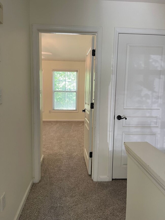 Building Photo - Lovely Condo in Gated Community at Brookwo...