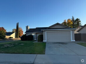 Building Photo - Corner lot with new paint & landscaper