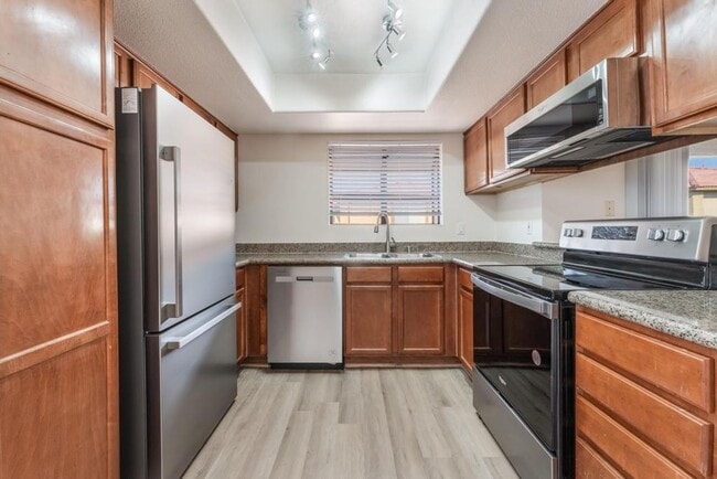 Building Photo - This beautifully renovated 2-bedroom, 2-bath condo is ready for immediate move-in!