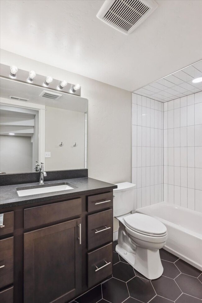 Building Photo - Modern 4-Bedroom Townhome with Rooftop Deck Near Sloan’s Lake & Light Rail