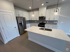 Building Photo - Brand New 3 Bedroom Gallatin Townhome