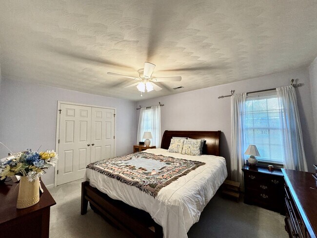 Building Photo - Fabulous 4-Bedroom Home w/2-Car Attached Garage! Dog Friendly - Screened Porch!