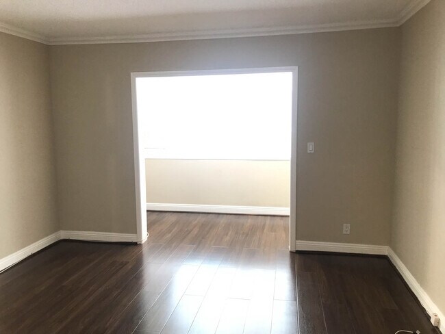 Large bedroom + wonderful sun-room that can be an office - 1126 N Central Ave